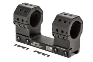 The Griffin Precision Mount (GPM™) Afford unmatched attachment versatility for accessories, backup optics, offset sites, or bubble levels by way of the Accessory Interface Suite (AIS™) with dowel pin alignment system. This is an image of a black Standard, unibody box scope mount Made in America from 6061-T6 aluminum. 